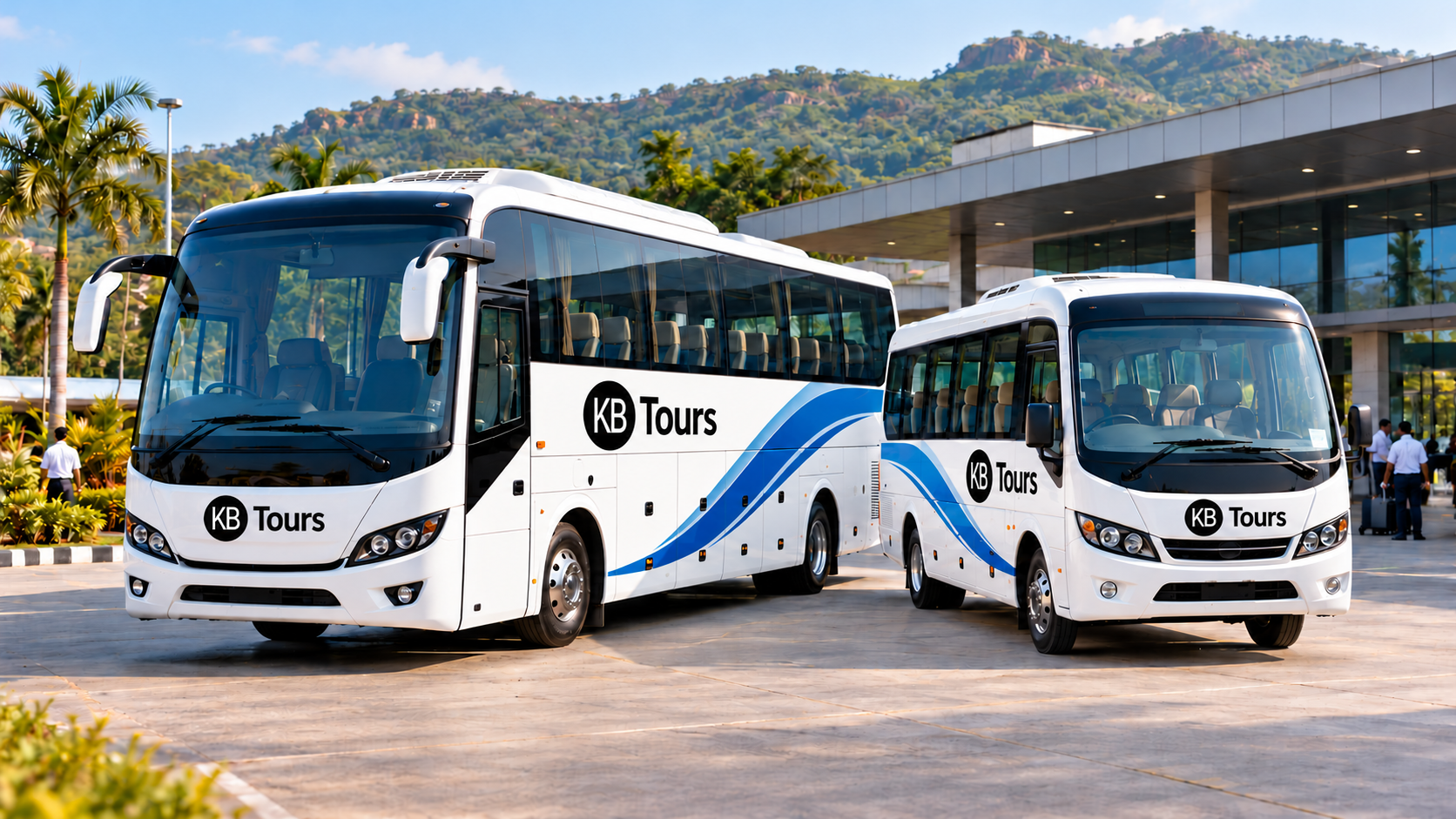 Premium KB Tours coaches at a modern depot